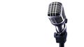 Classic microphone with a silver finish on a white isolated background Royalty Free Stock Photo