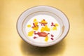 Classic milk dessert with a bit of innovation by adding some pieces of mango and grains of pomegranate