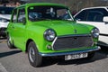 Classic Mini of green color parked in street