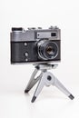 Classic 35mm old analog camera on tripod