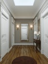 Classic modern hallway corridor interior with beige walls and white doors. Key table and a large mirror with sconces on the wall Royalty Free Stock Photo