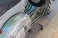 Classic motorcycle with badly weathered paintwork