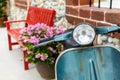 Classic motorcycle with red bench Royalty Free Stock Photo