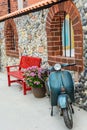 Classic motorcycle with red bench Royalty Free Stock Photo