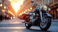Classic motorcycle at sunset in city street Royalty Free Stock Photo
