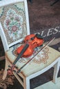 Classic music violin vintage, close up. Violin on chair