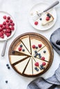 Classic New York cheesecake with fresh berries, top view