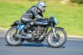 Classic Norton motorcycle on a race track Royalty Free Stock Photo