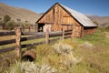 Classic Old Abaondoned Barn and Fence Royalty Free Stock Photo