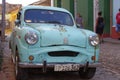 Classic old car on the colonial cobblestone streets Royalty Free Stock Photo