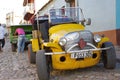 Classic old car on the colonial cobblestone streets Royalty Free Stock Photo