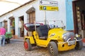 Classic old car on the colonial cobblestone streets Royalty Free Stock Photo