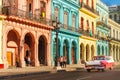 Classic old cars and colorful buildings in downtown Havana Royalty Free Stock Photo