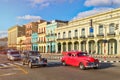 Classic old cars and colorful buildings in downtown Havana Royalty Free Stock Photo