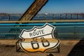 Classic Old Chain of Rocks Bridge crosses the Missouri River in St. Louis and shows classic neon signs of Route 66 - attached to b Royalty Free Stock Photo