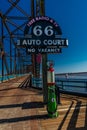 Classic Old Chain of Rocks Bridge crosses the Missouri River in St. Louis and shows classic neon signs of Route 66 Auto Court Royalty Free Stock Photo