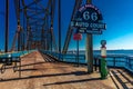 Classic Old Chain of Rocks Bridge crosses the Missouri River in St. Louis and shows classic neon signs of Route 66 Auto Court