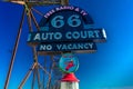 Classic Old Chain of Rocks Bridge crosses the Missouri River in St. Louis and shows classic neon signs of Route 66 Auto Court