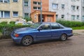 Old dark blue big luxury sedan Ford Scorpio I parked