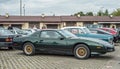 Classic old dark green veteran vintage historic muscle sports car Pontiac parked Royalty Free Stock Photo