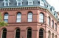 Classic Old Red Brick Building with Arched Windows Royalty Free Stock Photo