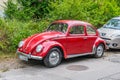 Old vintage red VW Beetle 1200 ccm parked