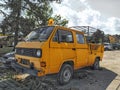 Classic old veteran vintage car small delivery van yellow Volkswagen Transporter T3 parked