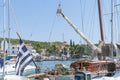 Classic old yacht with varnished wooden cabin and spars Royalty Free Stock Photo