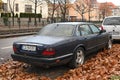 Classic old vintage veteran retro abandoned sedan car black Jaguar XJ Executive parked