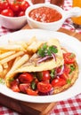 Classic omelete with cherry tomato Royalty Free Stock Photo