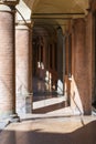 Classic orange gallery with columns in the sunlight