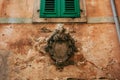 Classic outdoor bas-relief. Ancient statue on the walls of the o