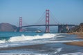 Classic panoramic view of famous Golden Gate Bridge seen from Baker Beach in beautiful summer sunny day with blue sky, San Royalty Free Stock Photo