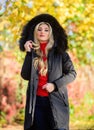 Classic parka coat has become wardrobe icon. Versatile functional and stylish. Girl wear parka while walk park. Puffer Royalty Free Stock Photo