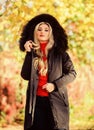 Classic parka coat has become wardrobe icon. Versatile functional and stylish. Girl wear parka while walk park. Puffer Royalty Free Stock Photo