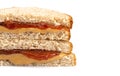 A Classic Peanut Butter and Strawberry Jelly Sandwich on Wheat B Royalty Free Stock Photo