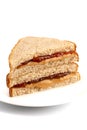 A Classic Peanut Butter and Strawberry Jelly Sandwich on Wheat B Royalty Free Stock Photo