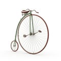 Vintage penny-farthing bicycle with a large front wheel and small rear wheel on a white background Royalty Free Stock Photo