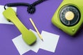 Classic phone with handset. pen with a note. office background. vintage green telephone with phone receiver. old communication Royalty Free Stock Photo