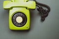 Classic phone with handset. vintage green telephone with phone receiver isolated on color background. old communication technology Royalty Free Stock Photo