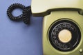 Classic phone with handset. vintage green telephone with phone receiver isolated on color background. old communication technology Royalty Free Stock Photo