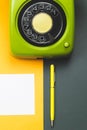 Classic phone. pen with a note. office background. vintage green telephone. old communication technology Royalty Free Stock Photo