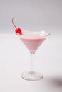 Classic pink lady cocktail on white background