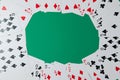 Classic playing cards on green background. Gambling and casino concept. Royalty Free Stock Photo