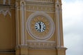 Classic pointer clock in church tower