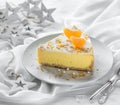 Classic Polish sernik cheesecake with tangerines on a white christmas concrete background. Copy space