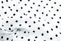 Classic polka dot textile background texture, black dots on white luxury fabric design pattern Royalty Free Stock Photo
