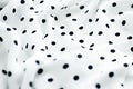 Classic polka dot textile background texture, black dots on white luxury fabric design pattern Royalty Free Stock Photo