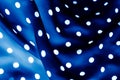 Classic polka dot textile background texture, white dots on blue luxury fabric design pattern Royalty Free Stock Photo