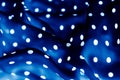 Classic polka dot textile background texture, white dots on blue luxury fabric design pattern Royalty Free Stock Photo